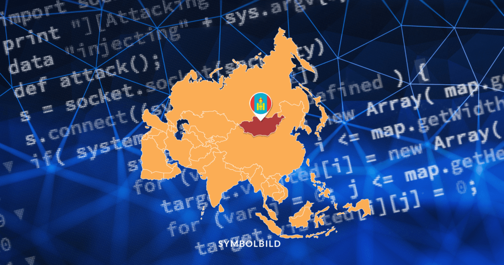 Das Bild zeigt eine stilisierte Karte von Asien in warmen Farben, im Zentrum ist die Mongolei hervorgehoben. Im Hintergrund sind digitale Elemente wie Codezeilen, Netzwerkmuster und der Begriff “data attack” mehrfach zu sehen. Symbolbild Mongolei Spyware